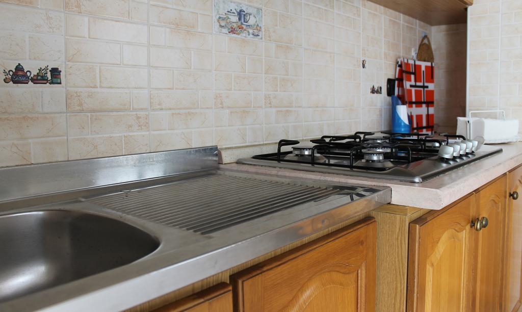 Casa Marinella Apartment อาเจโรลา ภายนอก รูปภาพ